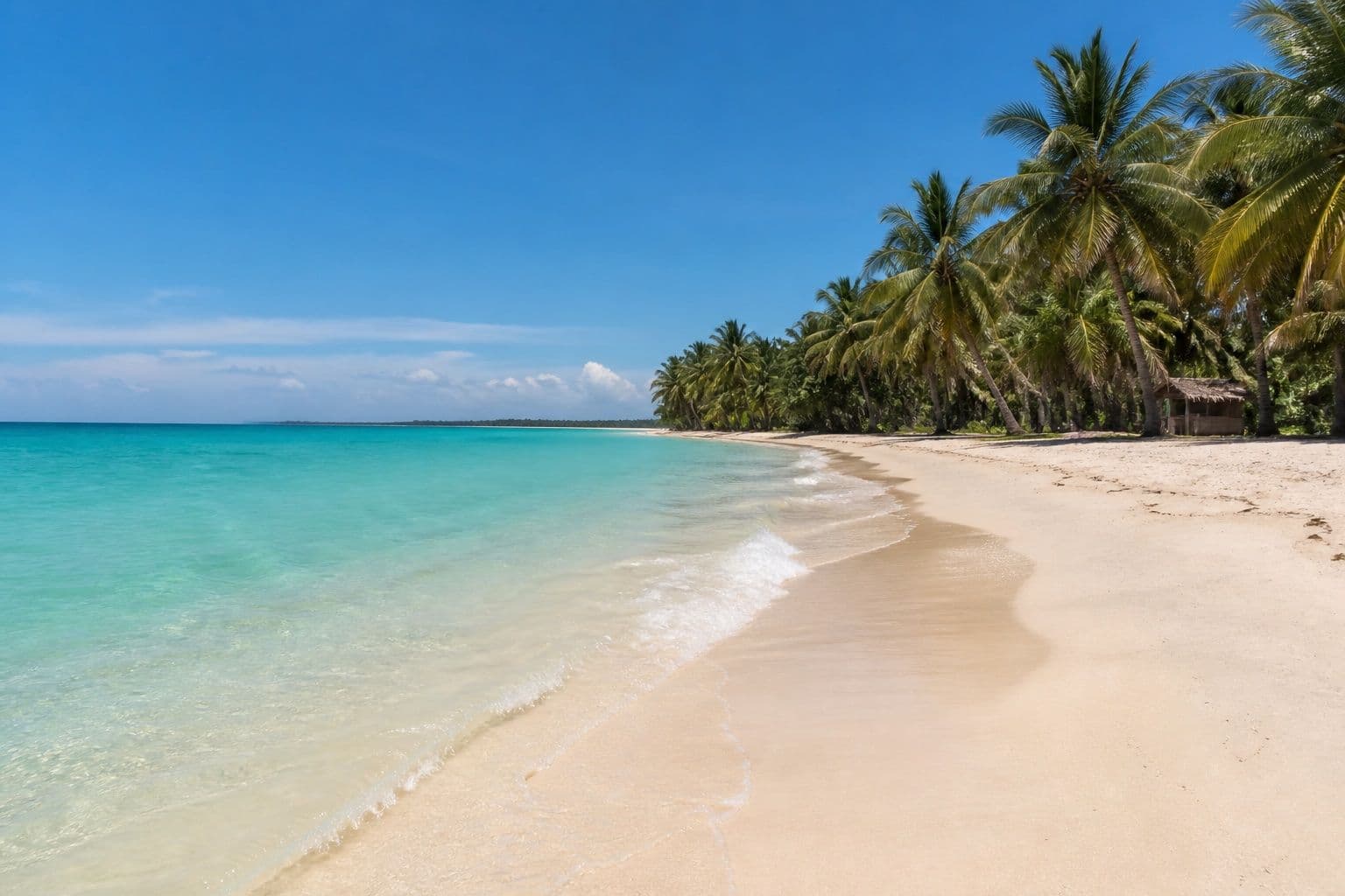 Clear turquoise east-coast beach in Sri Lanka during the dry season